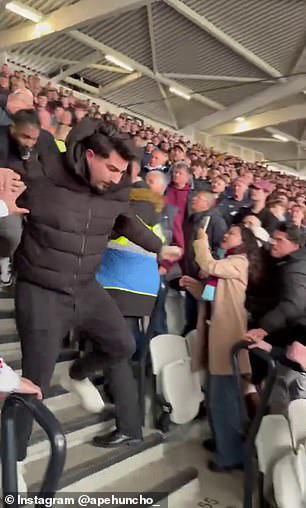 Arsenal fan is thrown down stadium steps after angering West Ham ...