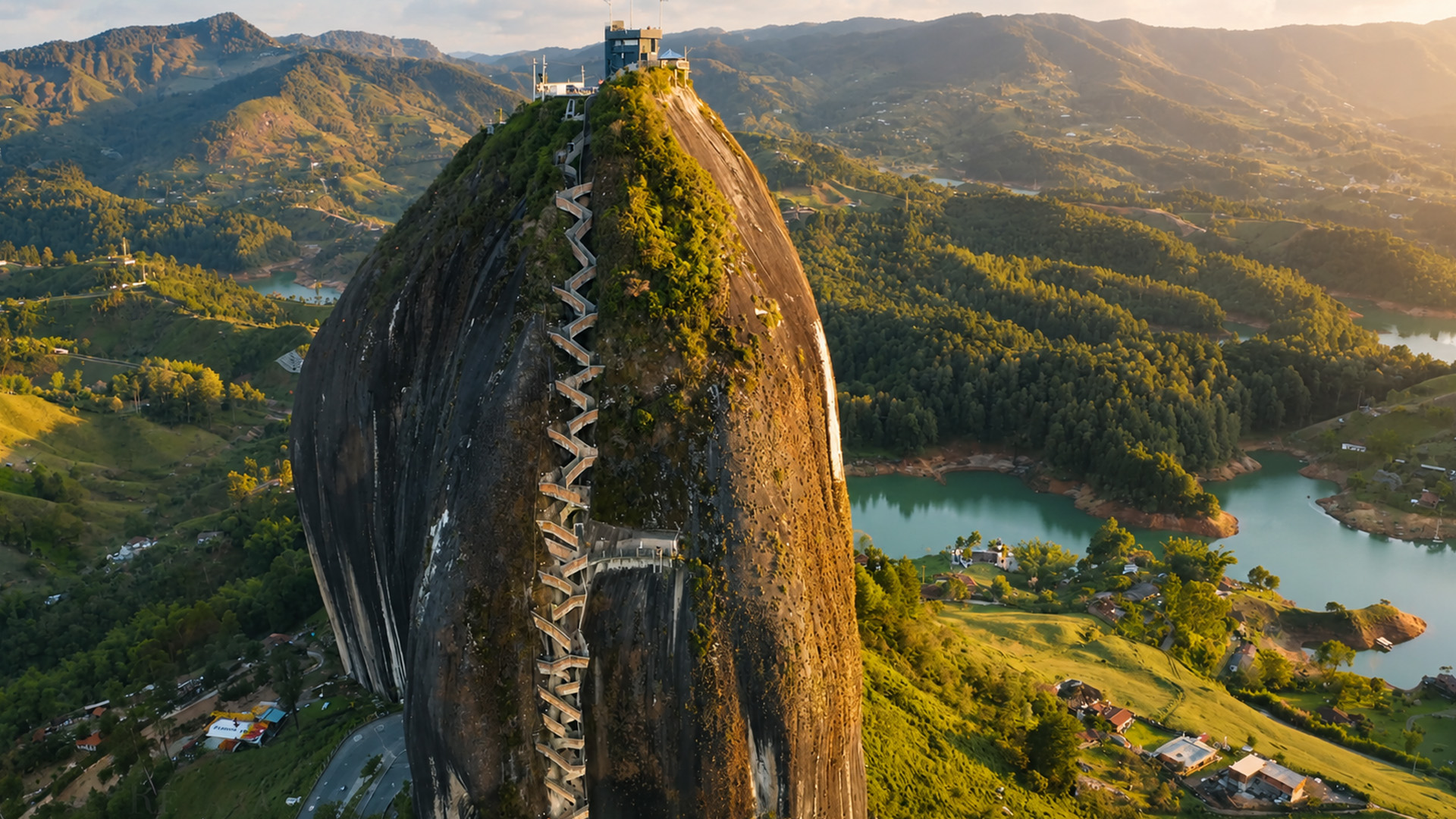 People climb hundreds of steps to reach this summit