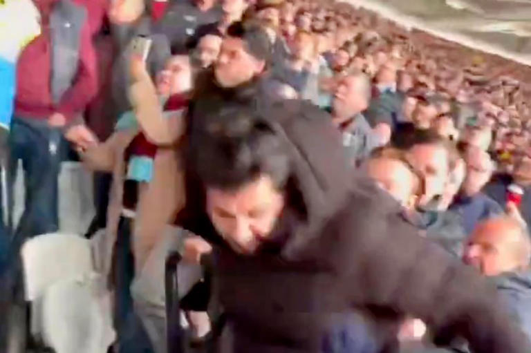 Arsenal fan 'thrown down home end steps' after angering fans during ...