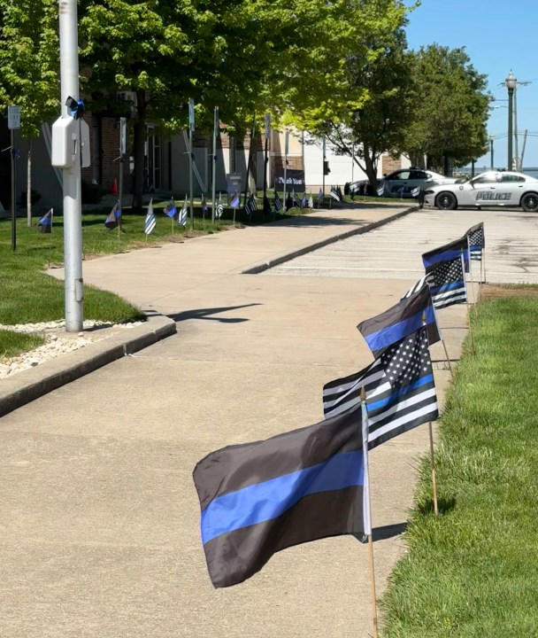 Volunteers honor local fallen officer for Police Week