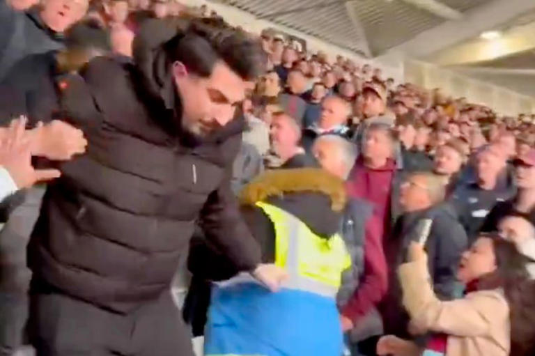 Arsenal fan 'thrown down home end steps' after angering fans during ...