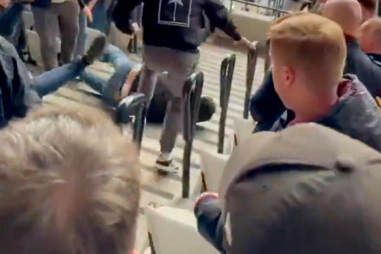 Arsenal fan 'thrown down home end steps' after angering fans during ...