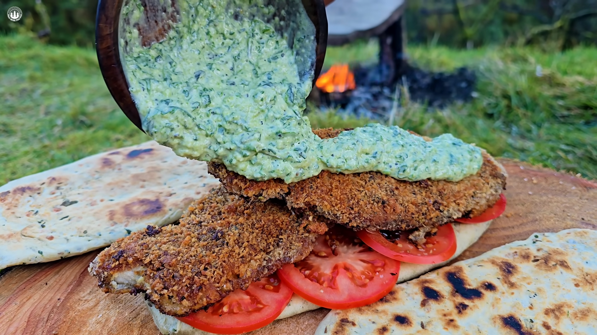 Watch how this schnitzel sandwich crisps up on volcanic stone
