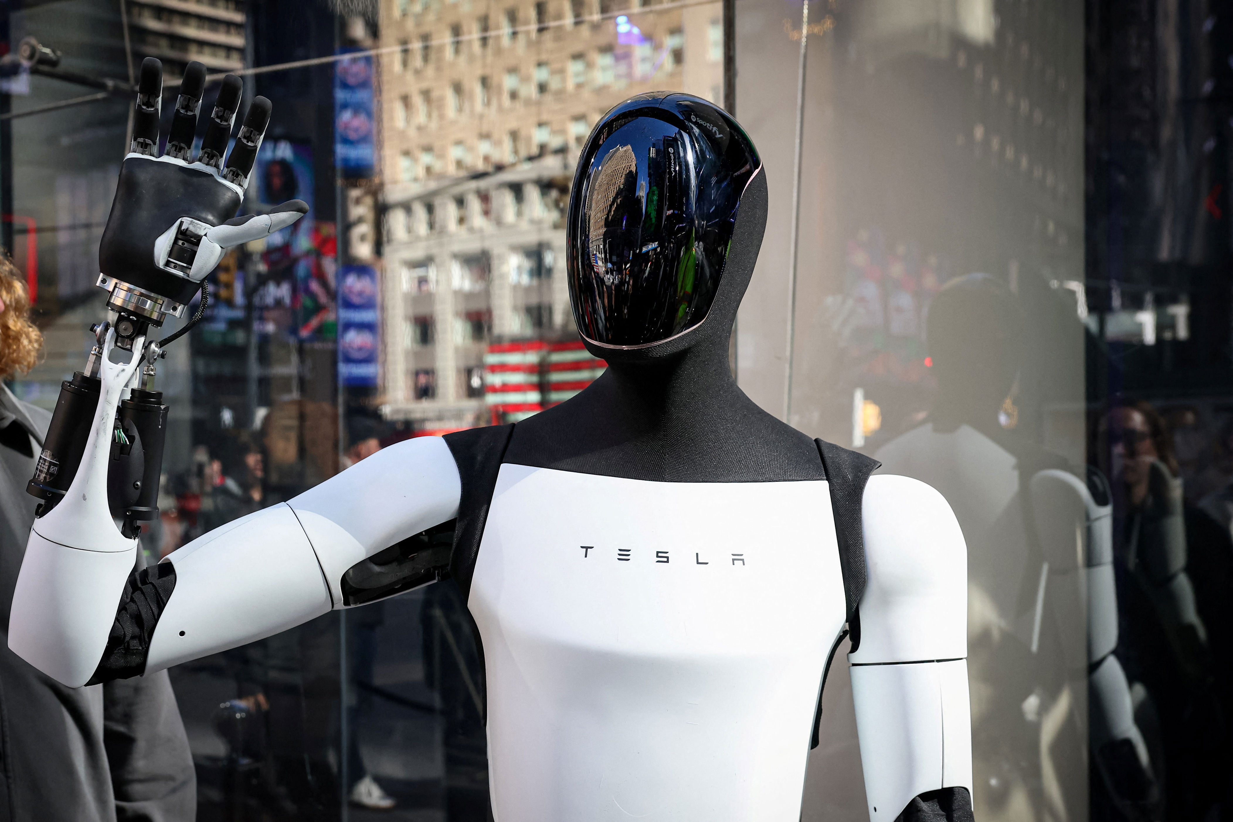 Elon Musk says Tesla's Optimus robot needs to learn like a toddler