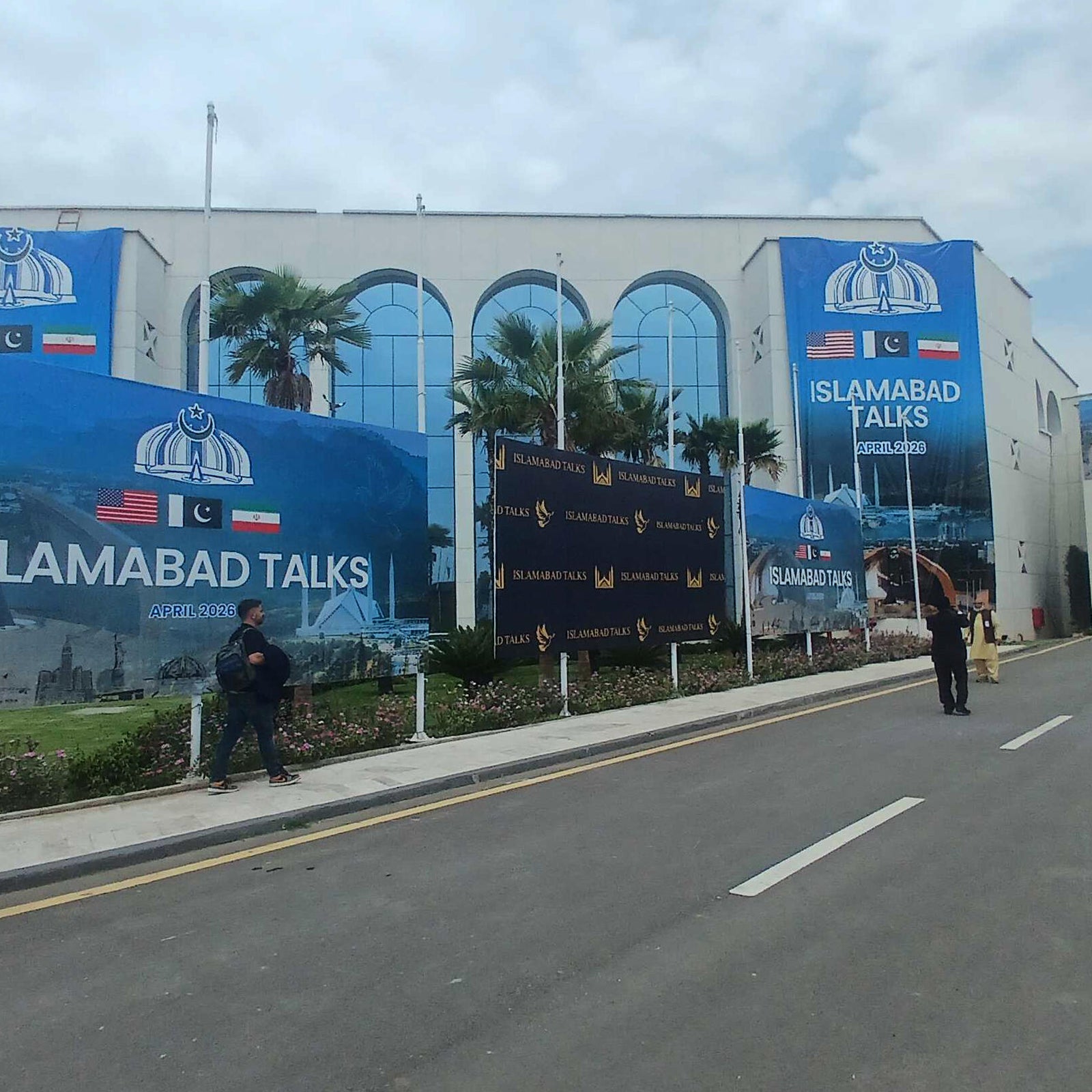 File: Pakistan, Islamabad: Journalists arrive at the media center in the heavily guarded red zone ahead of the talks between Iran and the US, April 11, 2026.