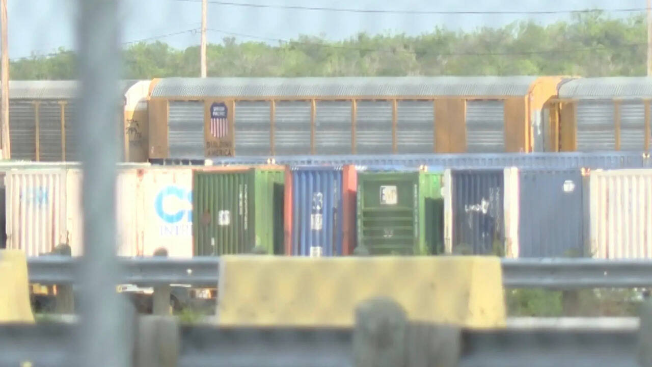 Heat stroke suspected in deaths of six found in shipping container near ...