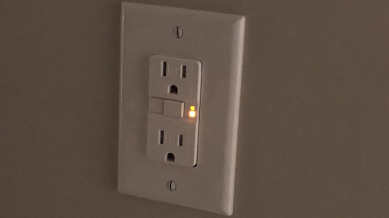 What's that orange light in certain power outlets for?