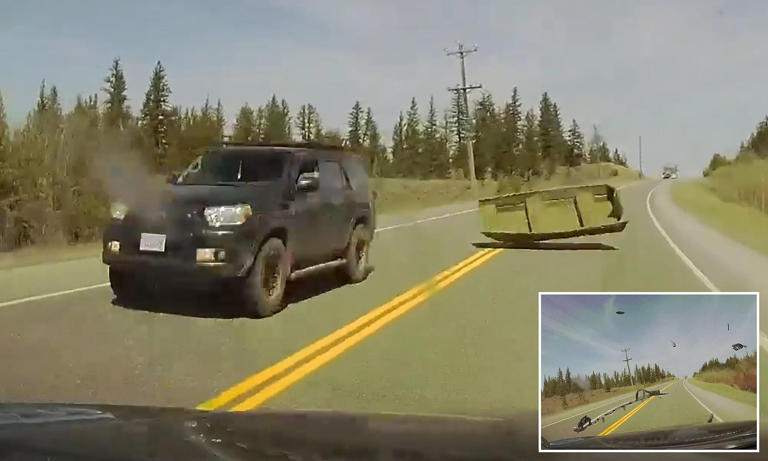 Family lucky to be alive after runaway boat flips off truck and smashes ...
