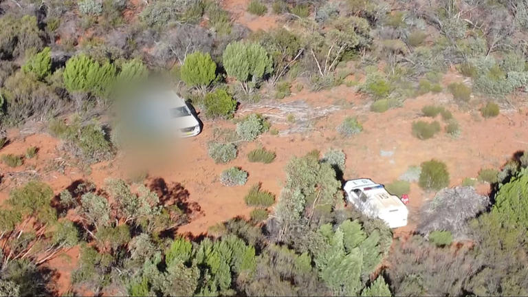 Aerial footage of a white ute discovered in a regional NSW national park in relation to the manhunt for triple killer Julian Ingram.
