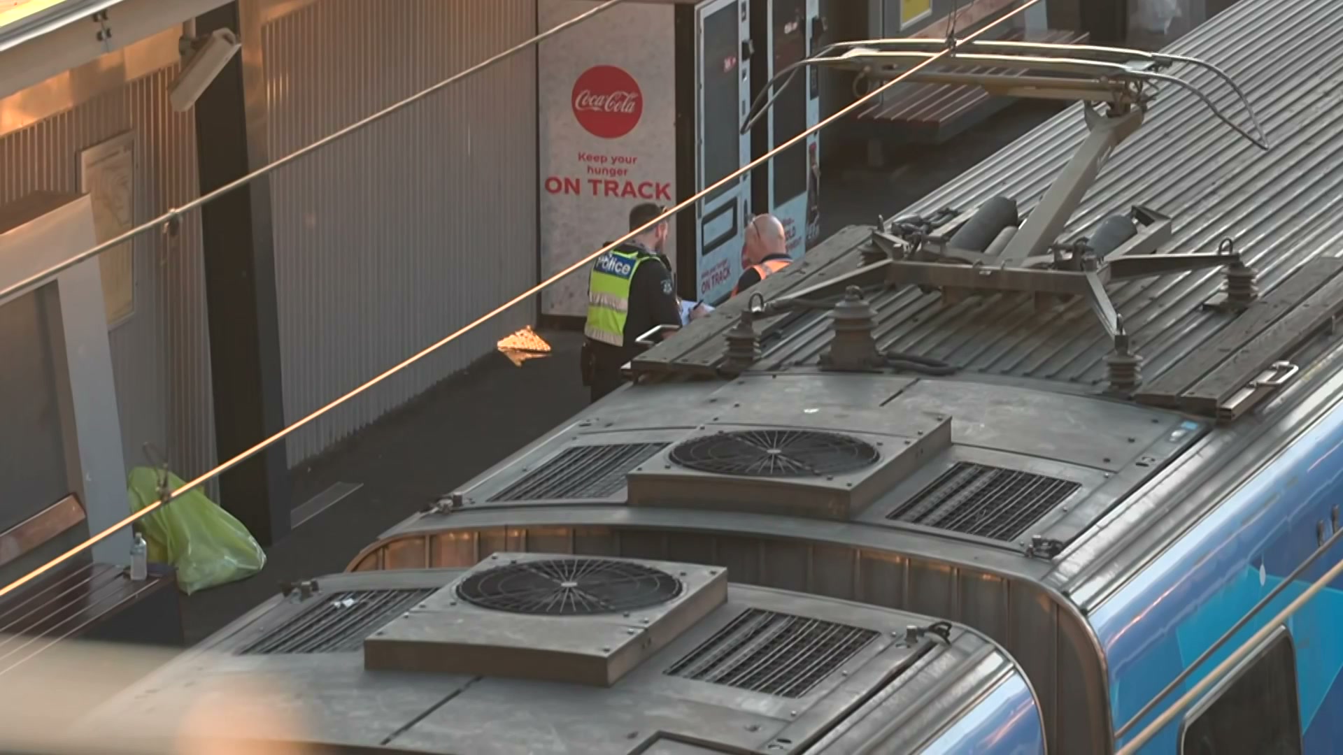 Melbourne student in hospital after becoming trapped under train
