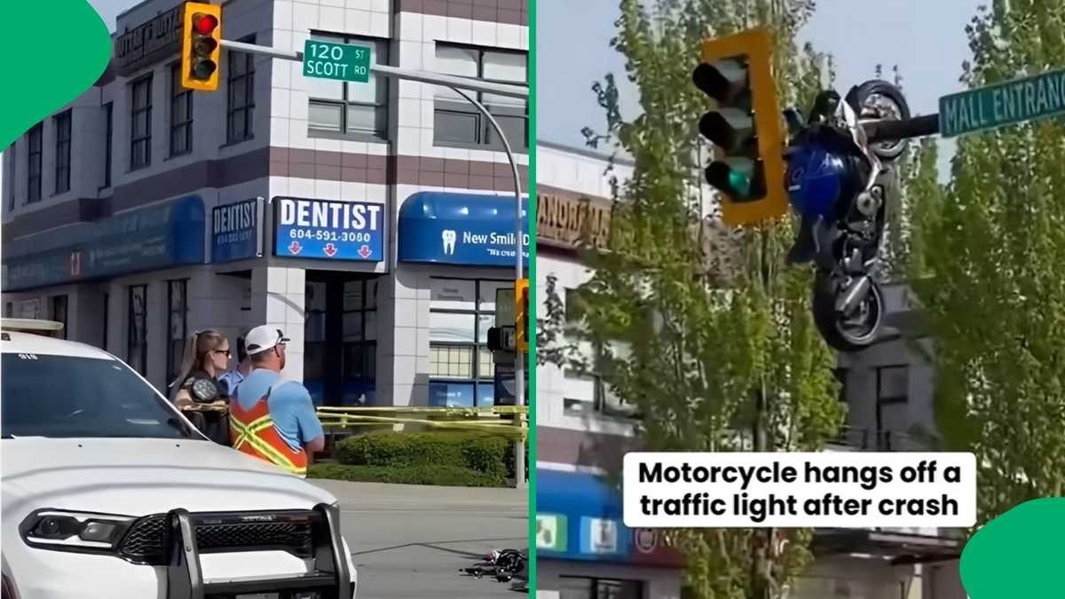 Hopefully the rider's ok: Motorcycle dangles on traffic lights after ...