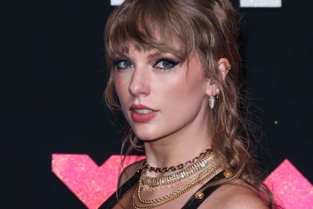 Taylor Swift’s black lace look steals attention on romantic Travis ...