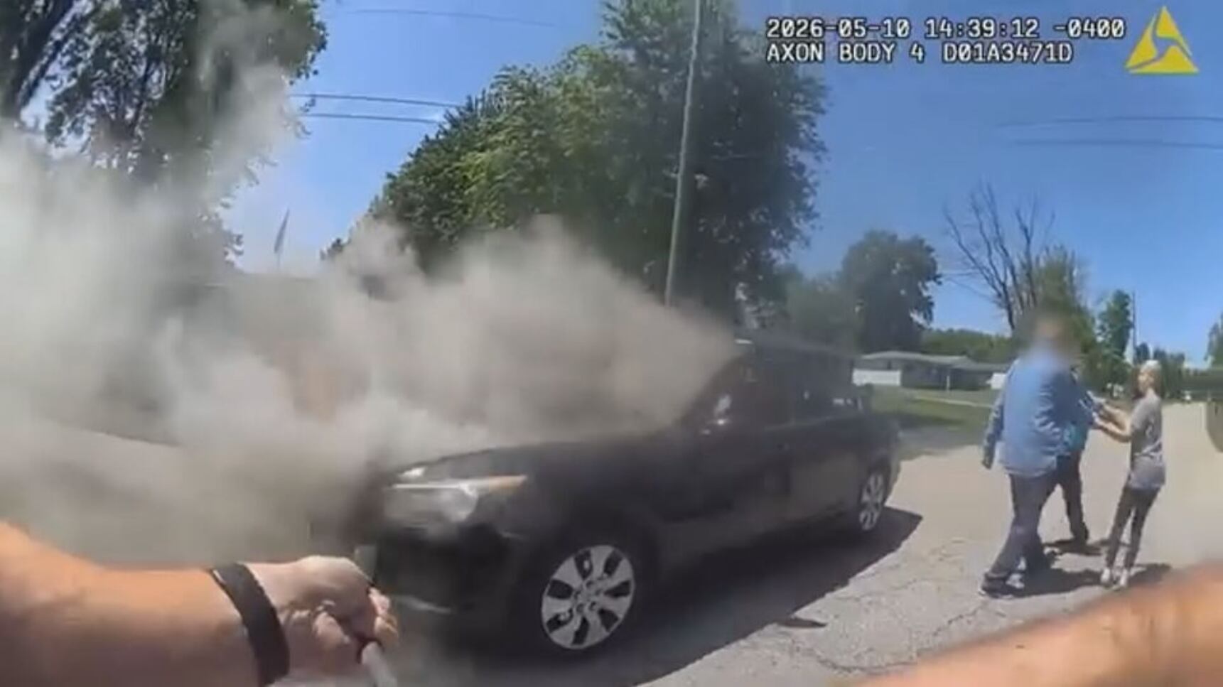 Area police officers rescue elderly man from burning vehicle