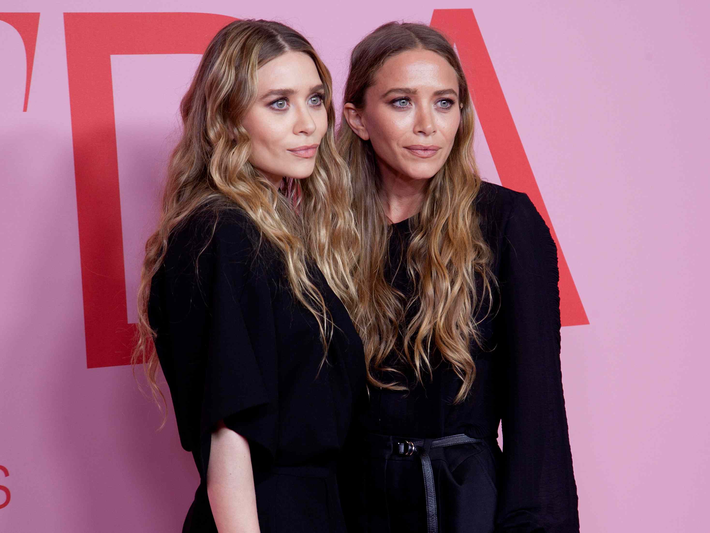 Mary-Kate and Ashley Olsen make a rare joint appearance swaddled in ...