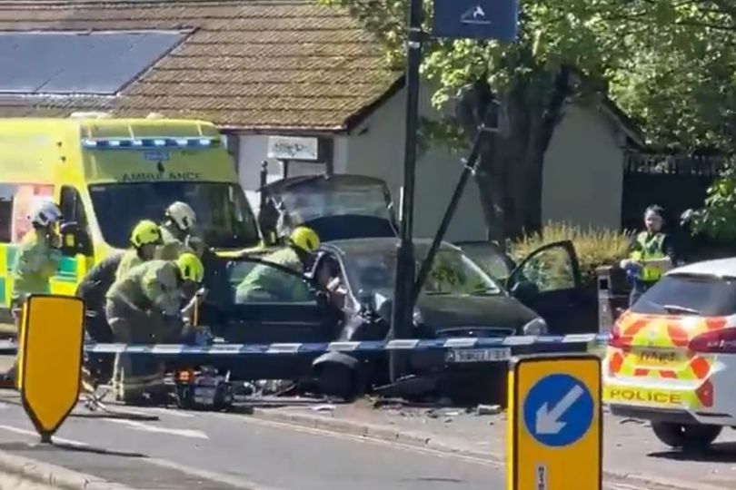 Driver who crashed into lamppost rescued after suffering medical ...