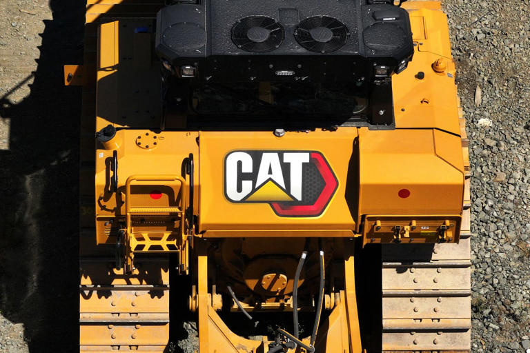 Caterpillar stock just hit a record high. Why Wall Street thinks it can ...
