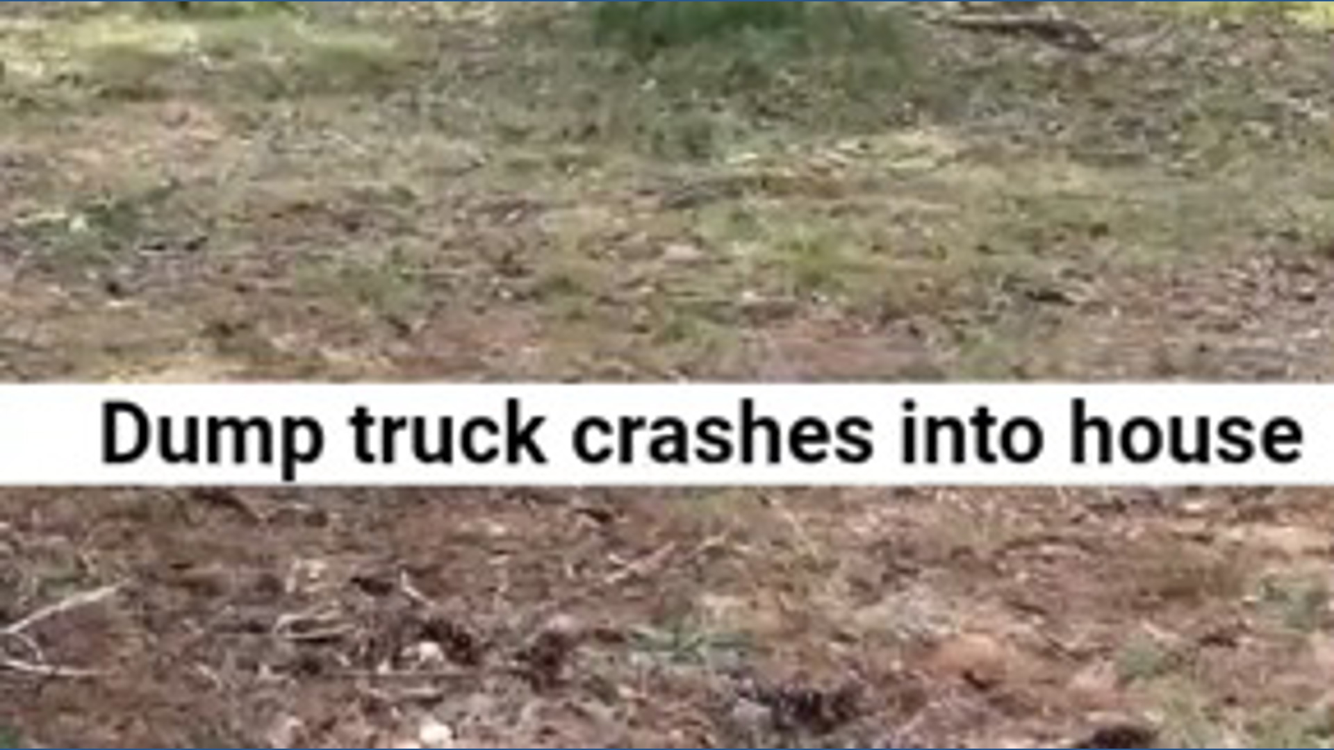 Dump truck crashes into house in Greensboro