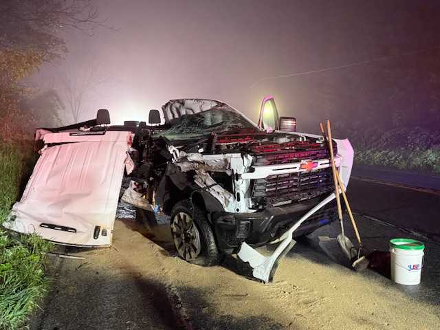 1 hospitalized after pickup truck crashes into tow truck, fire company says