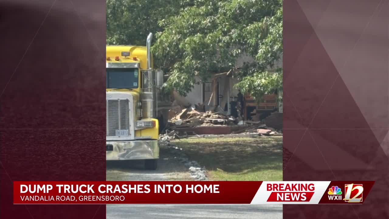 Dump truck crashes into Greensboro home