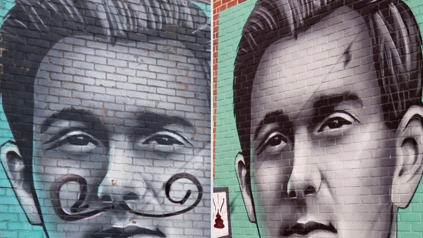 Vandalised mural of England footballer restored