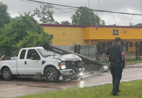 Truck knocks down power pole and transformer during stormy weather in ...
