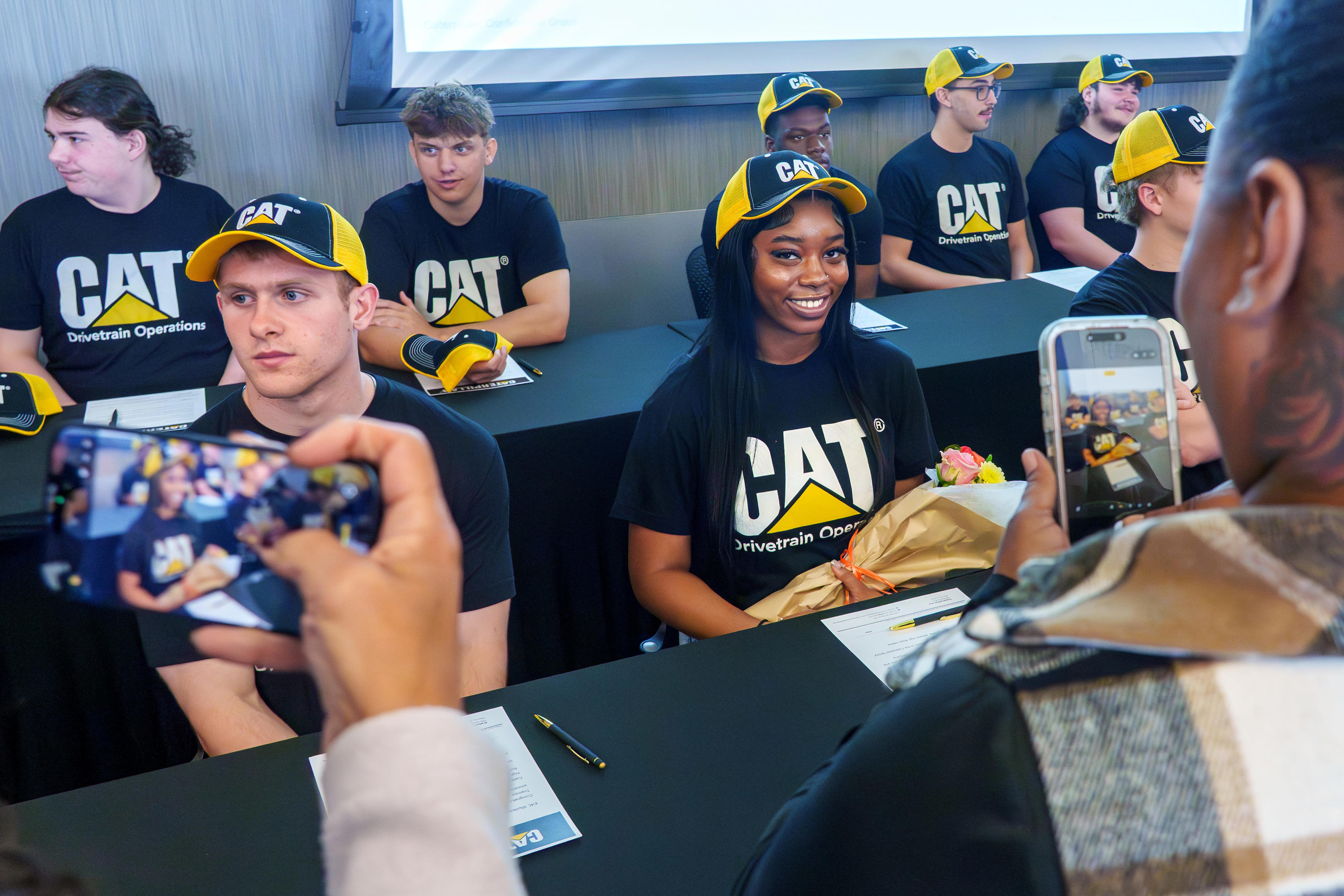 'Investing in people': Peoria area students sign offers from Caterpillar