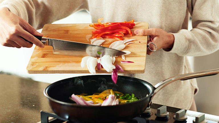Keep onions crunchy while they cook with this easy slicing method