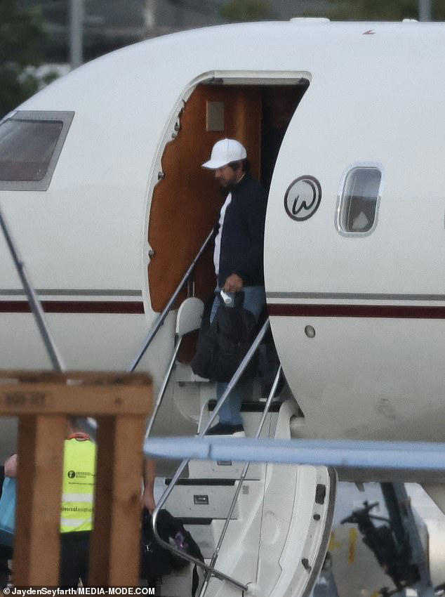 Mark Wahlberg appears very different as he touches down in Australia