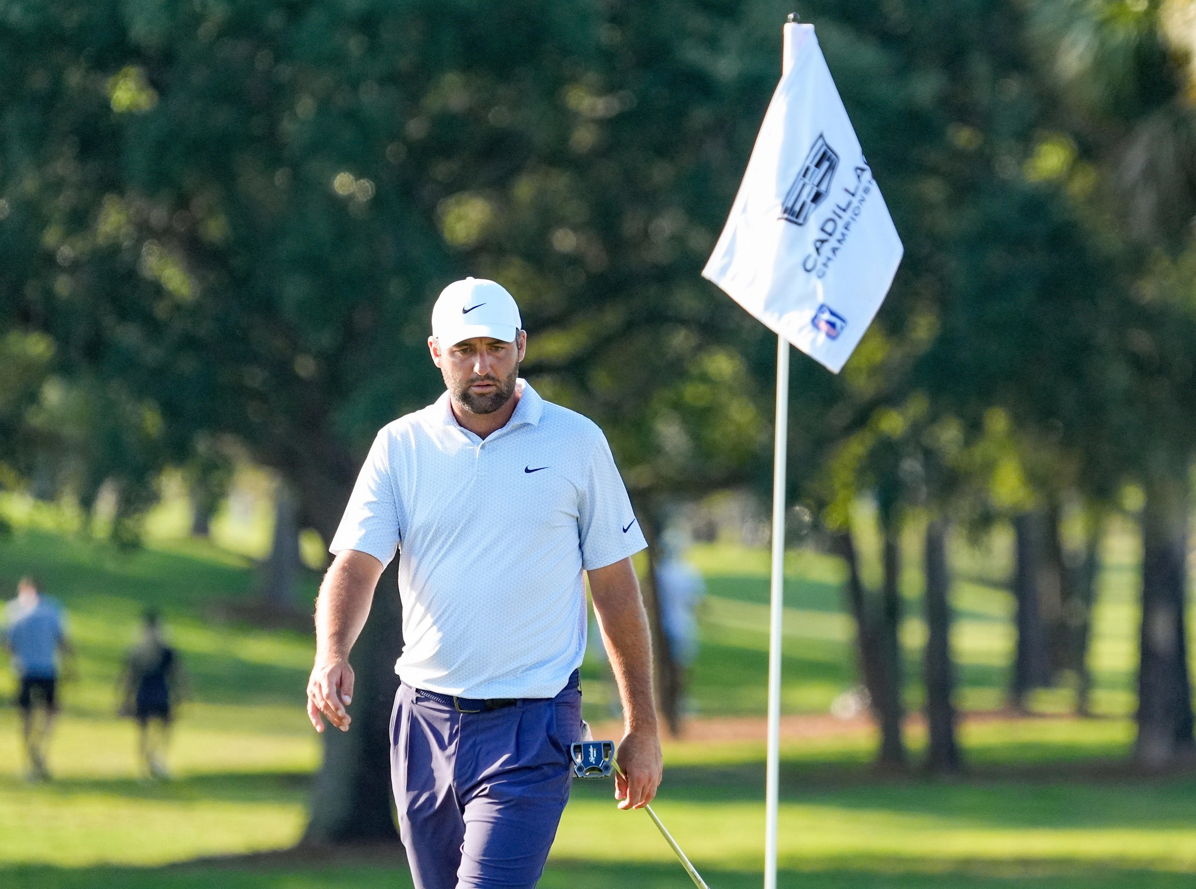 May 1, 2026; Miami, Florida, USA; Scottie Scheffler studies his putt on the 17th hole during the second round of the Cadillac Championship golf tournament. Mandatory Credit: Jeff Romance-Imagn Images