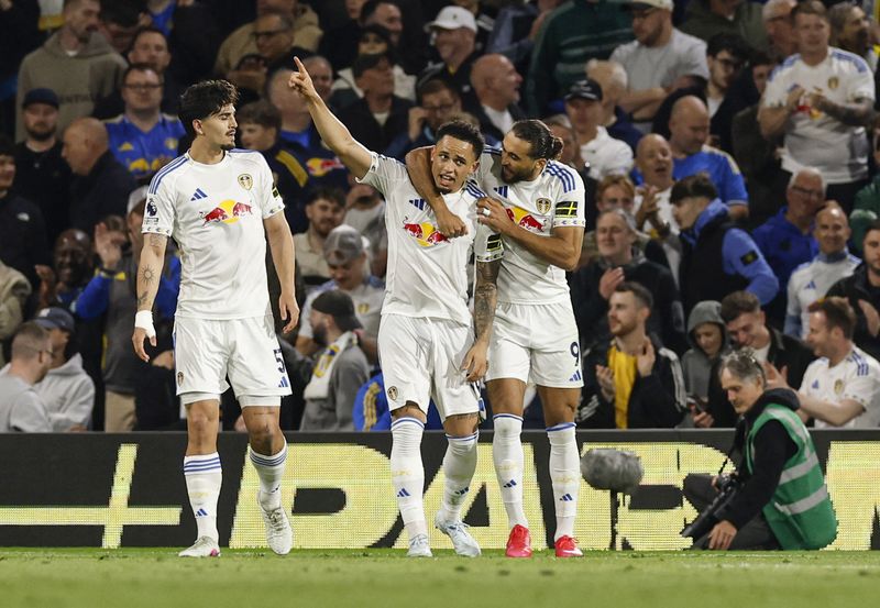 Soccer-Leeds edge closer to Premier League safety after 3-1 Burnley victory