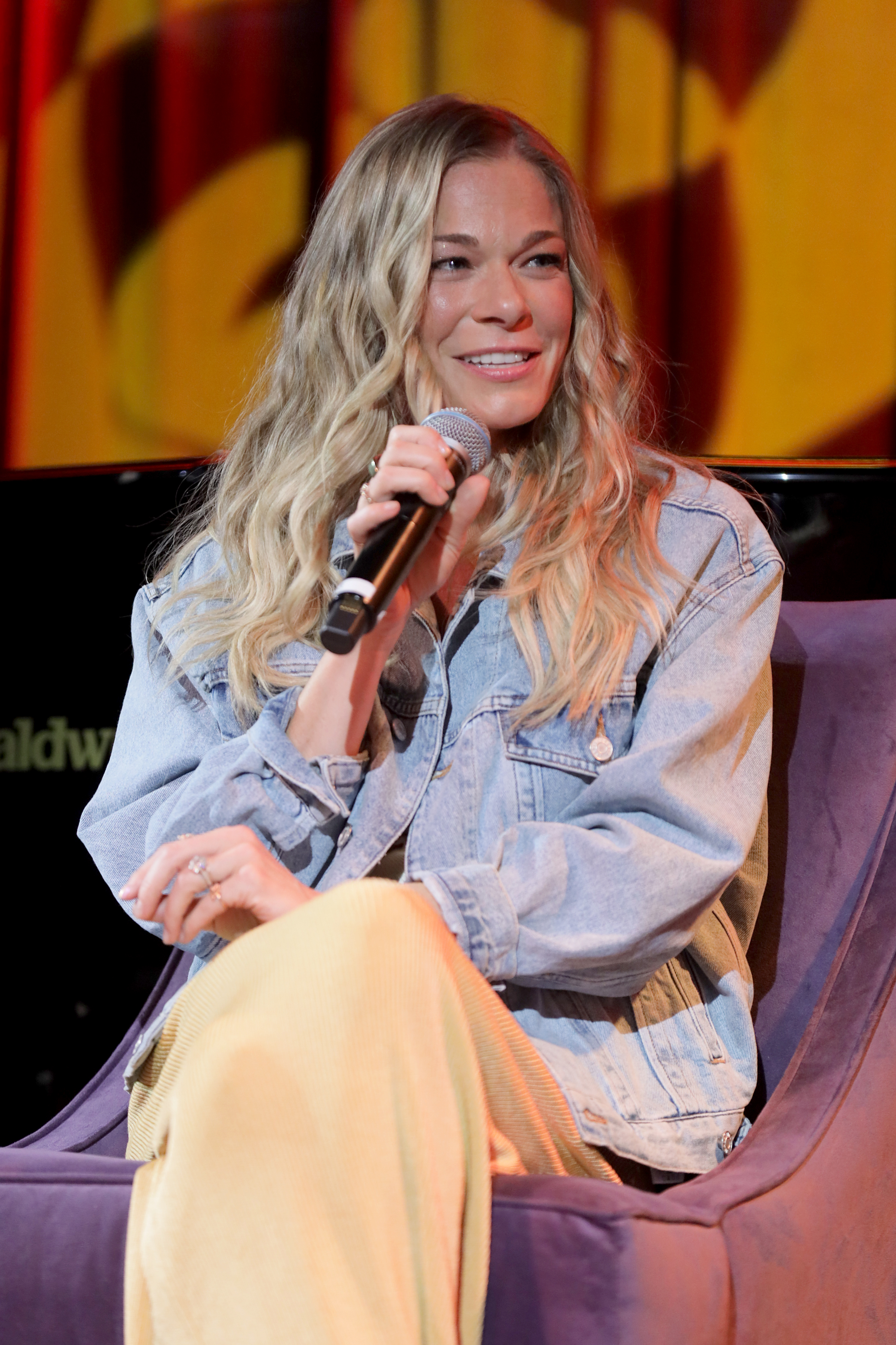 LeAnn Rimes speaking onstage.