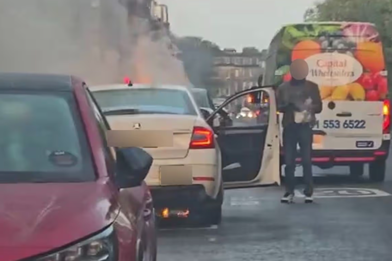 Taxi bursts into flames in Edinburgh city centre as crews race to scene