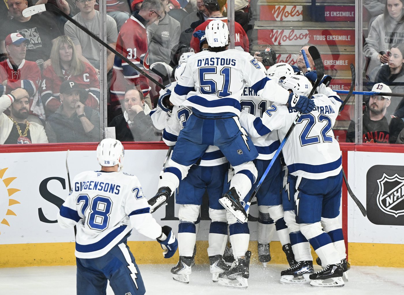 Lightning pull out 1-0 overtime road win over Montreal to send series ...