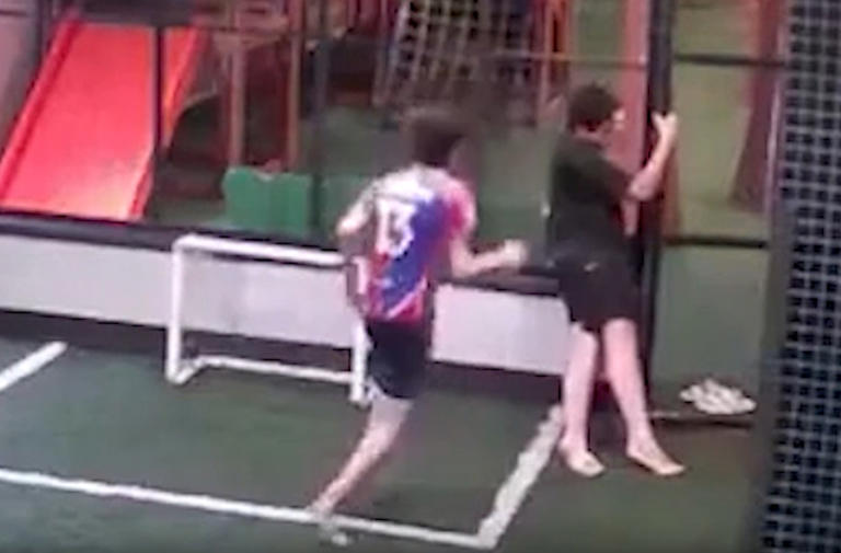 Moment hero boy risks his life to save friend stuck to electrified ...