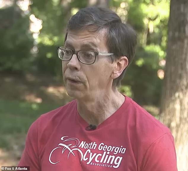 Elderly man smirks in mugshot as he is charged over 'road rage ...
