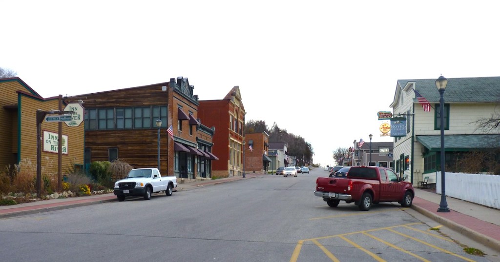 Main street of downtown Trempealeau, Wisconsin, featuring historic buildings and local storefronts.