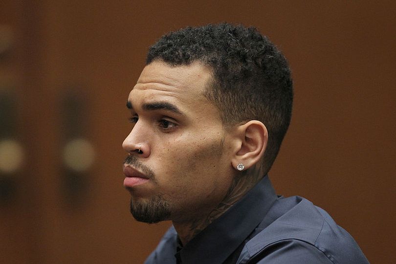Chaos outside of Chris Brown's LA home as shots fired and suspect in ...