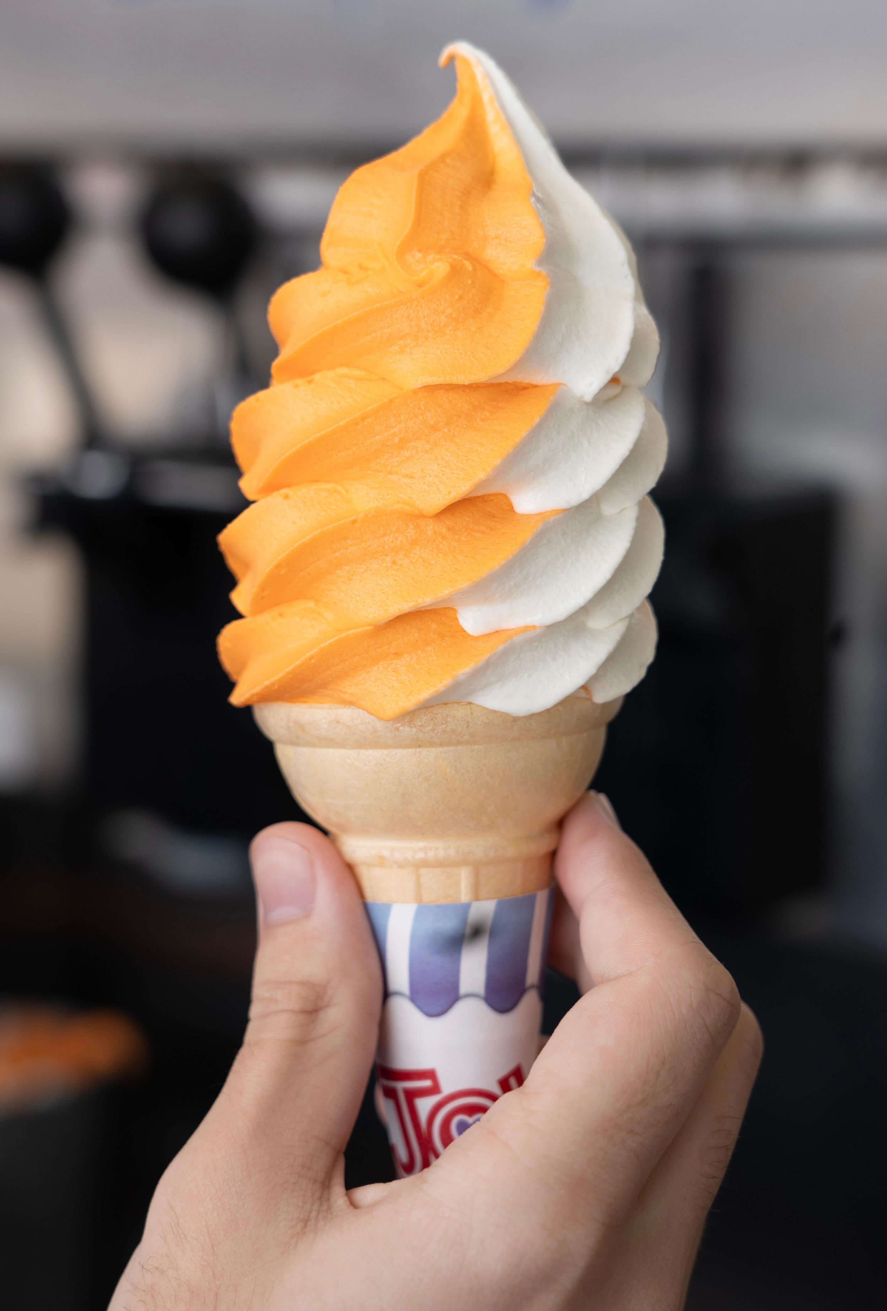 The boardwalks of the Jersey Shore are filled with establishments that have been around for a long time. Chase Kaniruk, store manager, makes an orange cream cone at Kohr’s the Original Frozen Custard Ice Cream in Seaside Heights, New Jersey on Saturday, March 21, 2026.