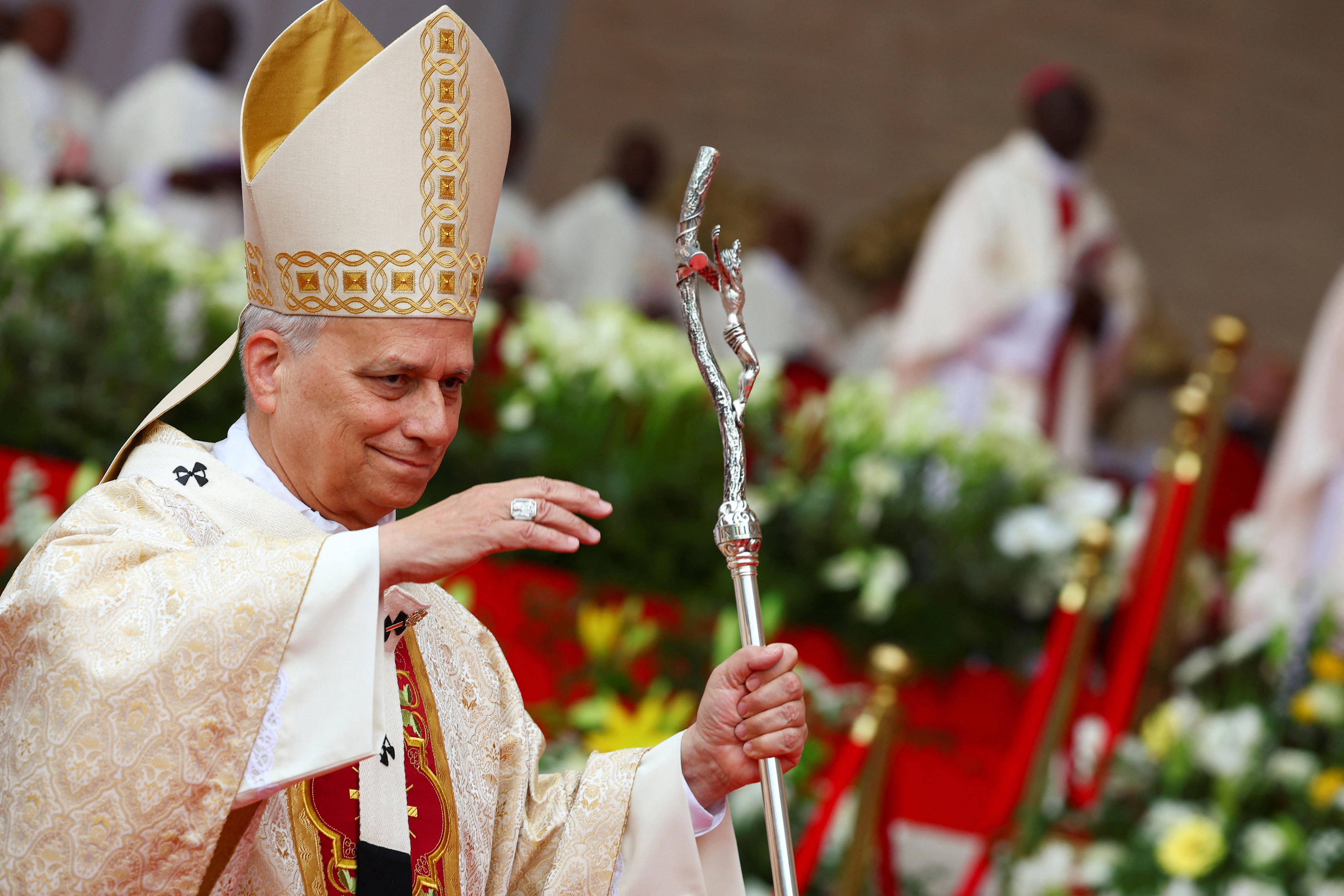 Pope Leo XIV gestures, on the day he holds a holy Mass at Malabo Stadium, on the last day of his apostolic journey, in Malabo, Equatorial Guinea, April 23, 2026. REUTERS/Guglielmo Mangiapane