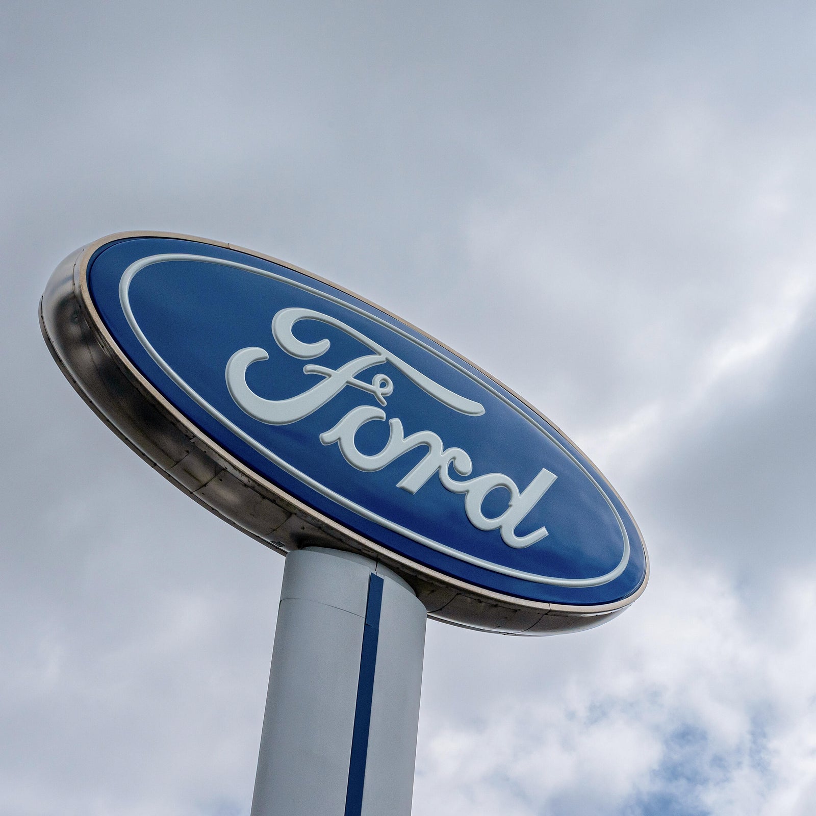 Signage at a Ford dealership in Richmond, California, US, on Wednesday, April 16, 2025. US retail sales rose substantially in March on a jump in car purchases and other goods such as electronics, suggesting consumers were scrambling to get ahead of tariffs.