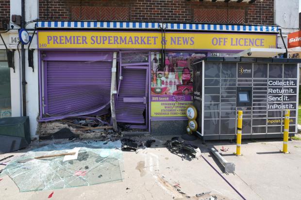 Trader describes shocking moment car smashed into family shop late at night