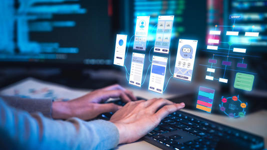 A person typing on a keyboard, with multiple icons floating over it