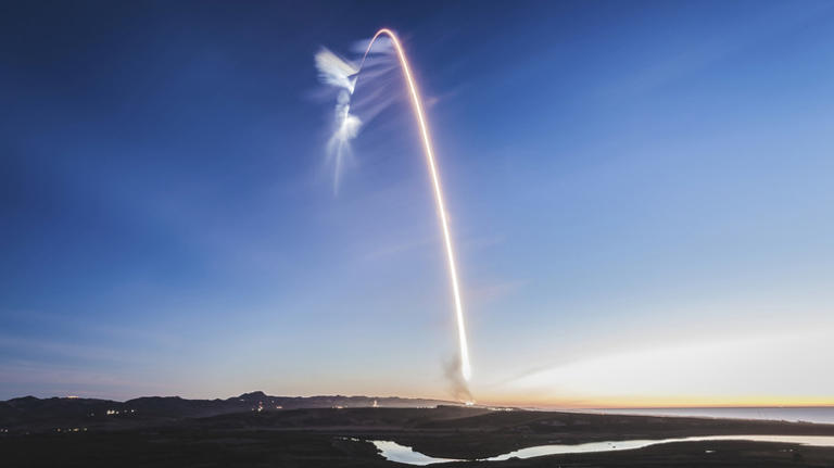 Why do rockets curve instead of shooting straight up at launch?