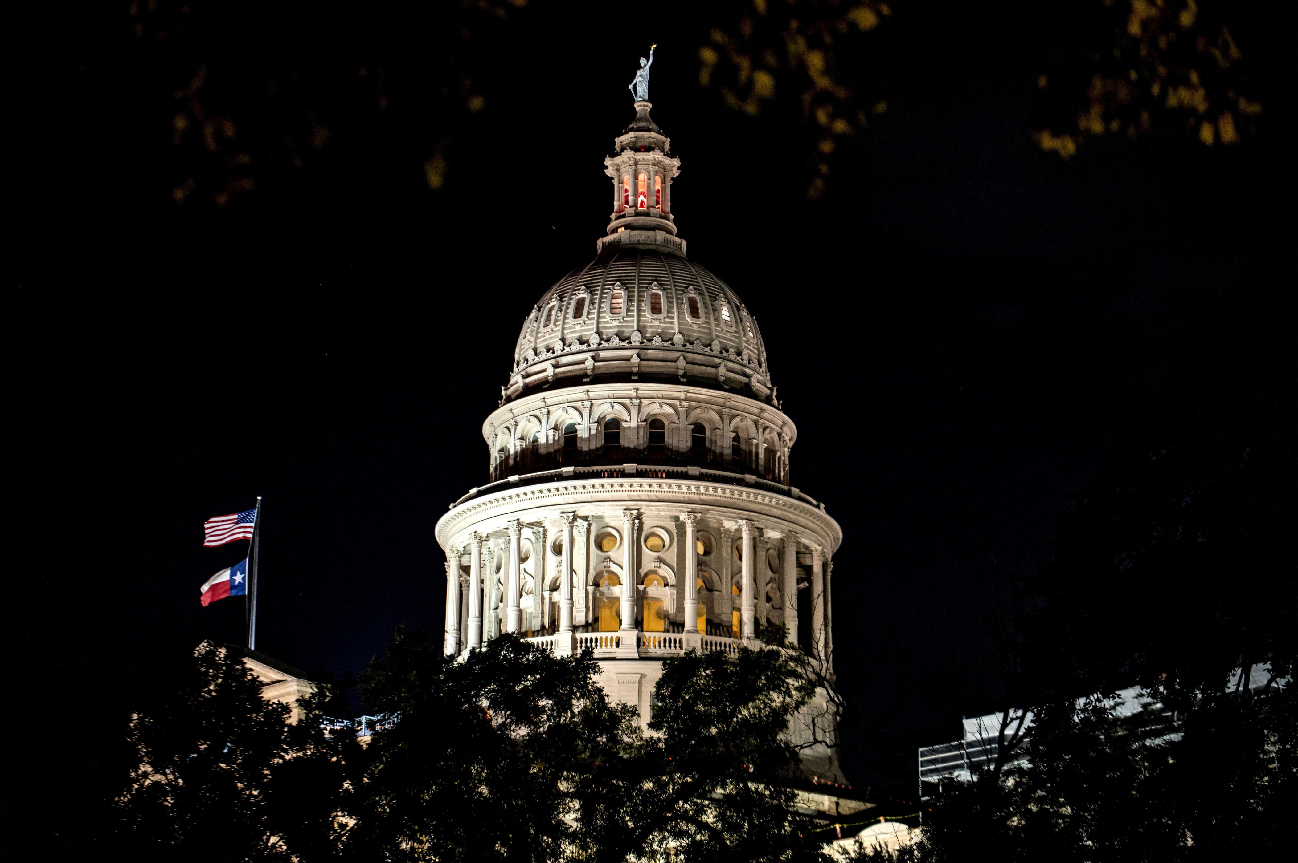 The Texas Capitol is lit during a session in the State Senate, as Republicans attempt to pass an HB 4, a bill that would redraw the state's 38 Congressional Districts, in Austin, Texas, on Aug. 22, 2025.