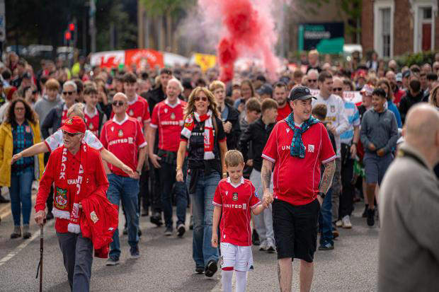 Wrexham fans' 'electric' 12th man march ahead of last game of the season