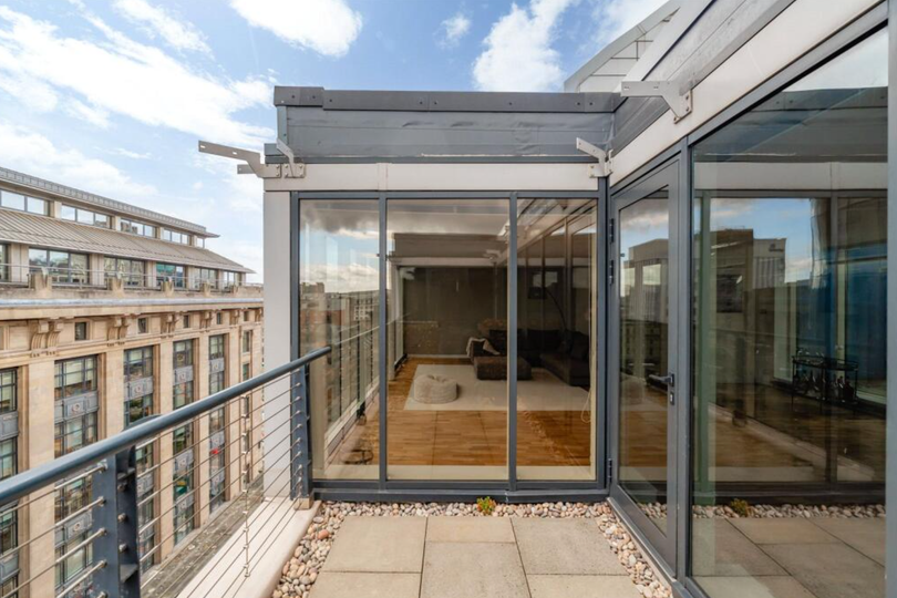 Image showcasing Stunning Glasgow penthouse with two balconies atop A-listed building up ...