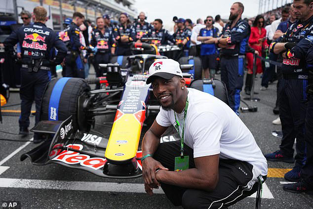 Heat basketball star Bam Adebayo posed with a Red Bull car before the race got underway