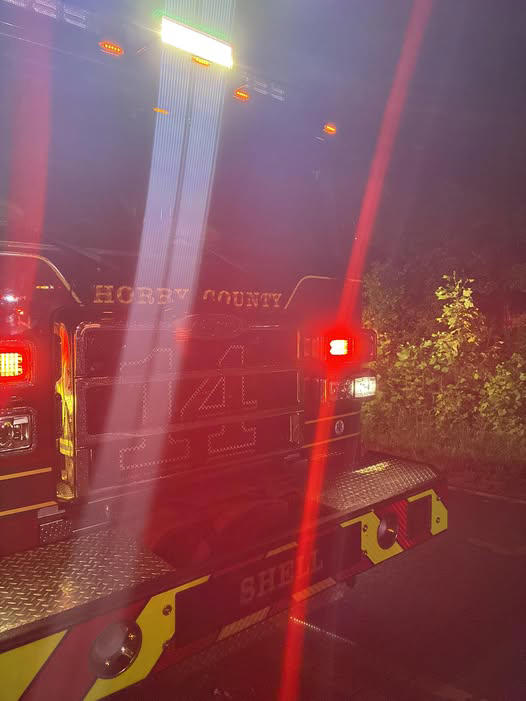 One hurt after vehicle flips, strikes tree in Horry County