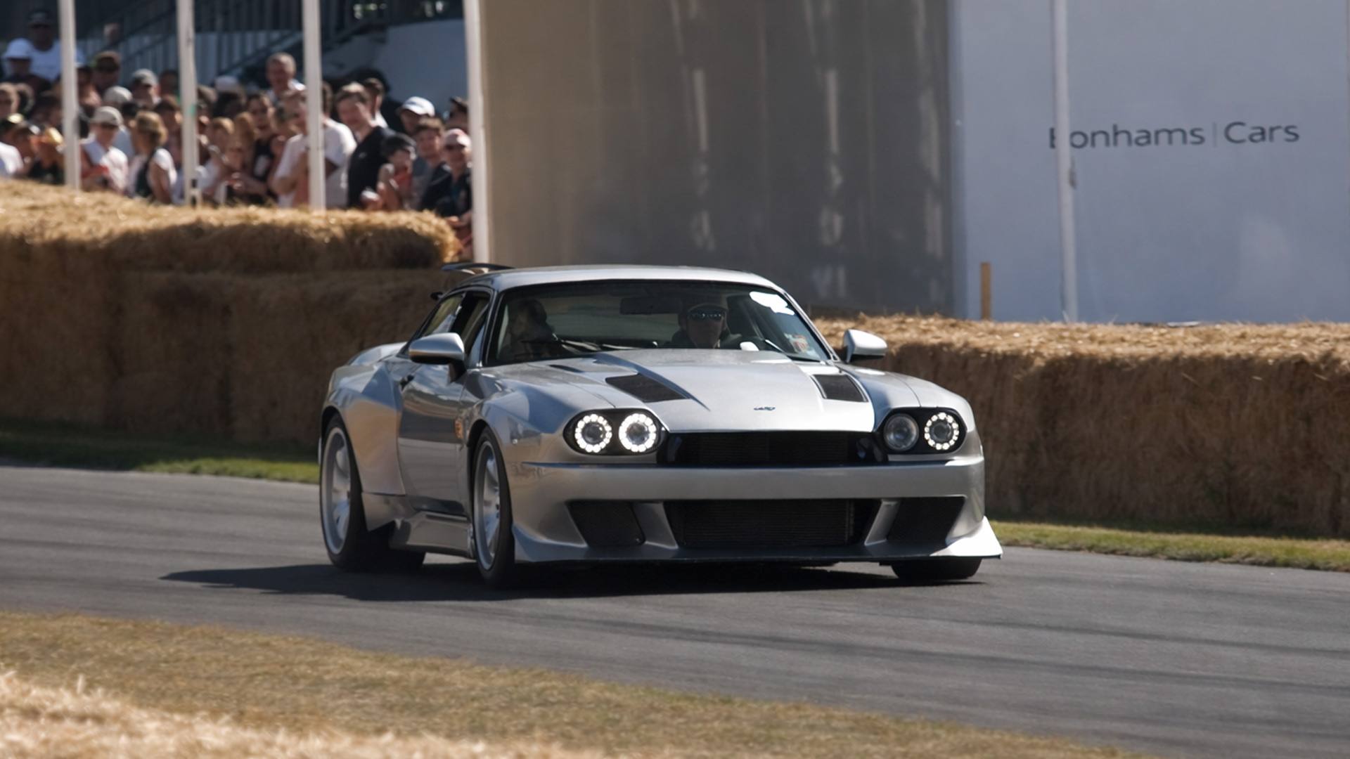 Classic Jaguar XJS V12 racing on the track