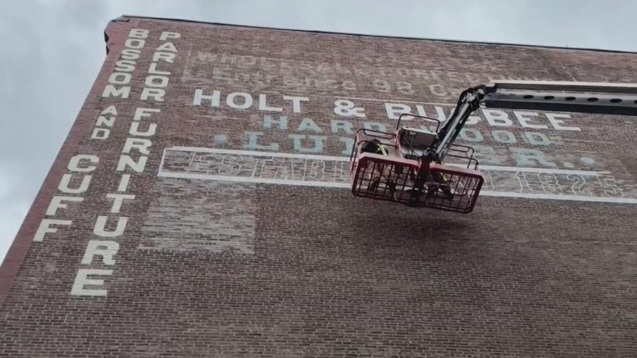 Brothers working to revive Boston's past by repainting so-called ghost ...